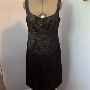 This is a cocktail dress with corset stitching on the bodice